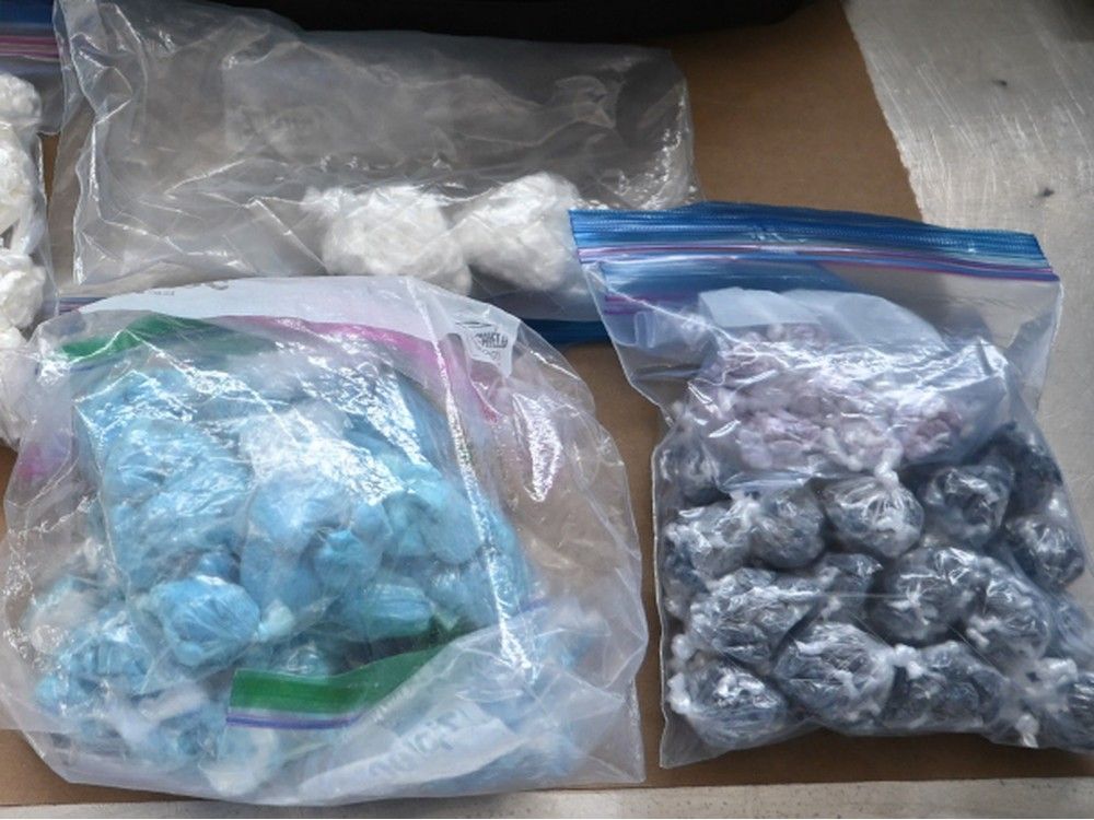 Edmonton police say they seized more than $1.5 million worth of fentanyl and other drugs, along with 12 prohibited firearms.