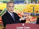 Prime Minister Mark Carney makes an announcement about affordability at a grocery store in Ottawa, Ontario January 26, 2026. Food prices in Canada rose seven per cent in the past year, more than twice the rate in the U.S. and 50 per cent more than in Western Europe.