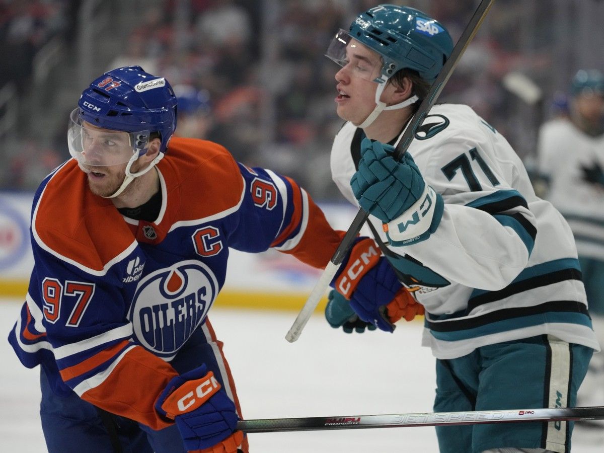 Edmonton Oilers Connor McDavid (97) and San Jose Sharks Macklin Celebrini (71)