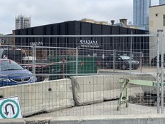 Khazana's Downtown location is seen behind construction fences and barriers.