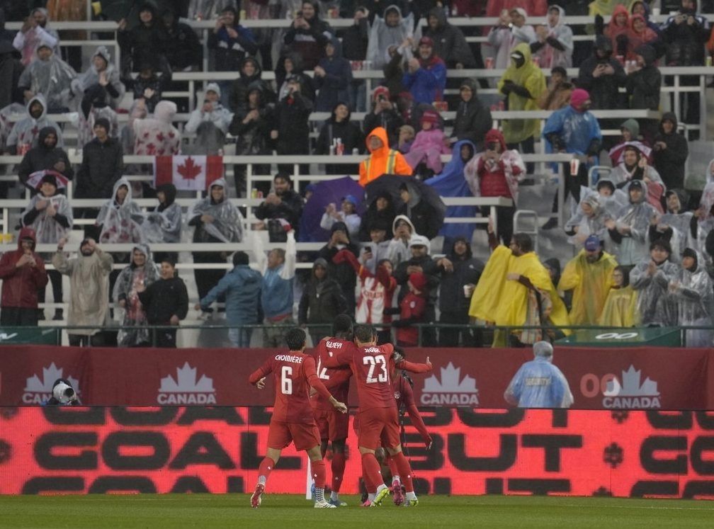 Jonathan Osorio of Canada celebrates with teammates after scoring his team's first goal during the international friendly match between Canada and Uzbekistan at Commonwealth Stadium on June 01, 2026 in Edmonton.