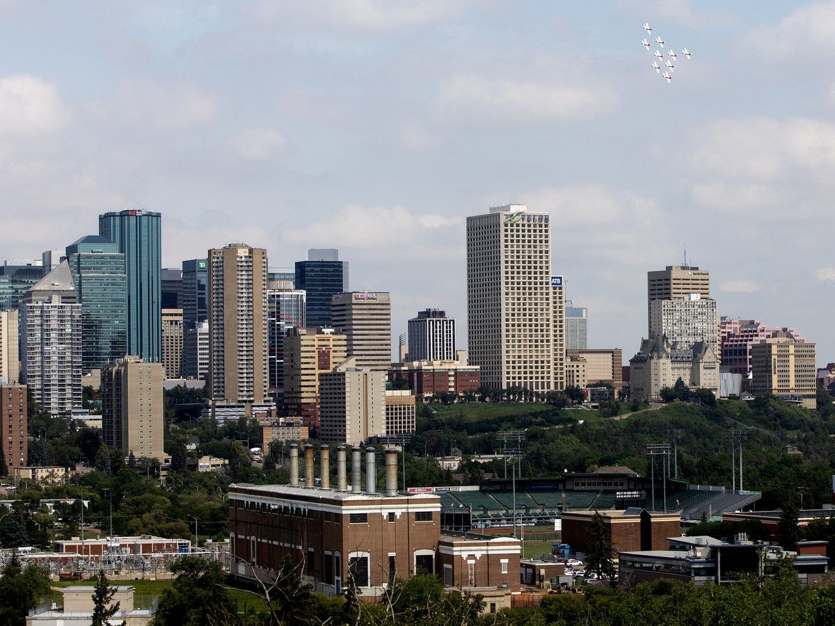 The Snowbirds (top right) perform their final fly-over Edmonton, Wednesday July 15, 2026. The Canadian Air Force tudor jets, used by the Snowbirds, have been retired at the end of the summer.