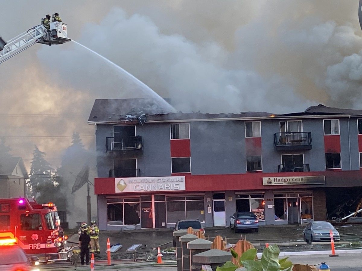 An apartment fire in north Edmonton has left one dead, multiple injured after a vehicle hit the building and gas line, causing an explosion.