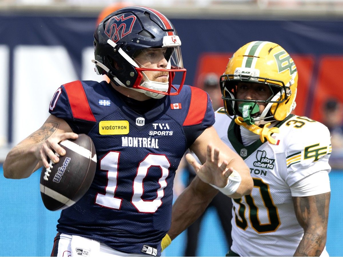 MONTREAL, QUE.: August 8, 2026 -- Edmonton Elks defensive back Tyrell Ford (30) chases Montreal Alouettes quarterback Davis Alexander (10) during 1st half CFL action in Montreal on Saturday, August 8, 2026.