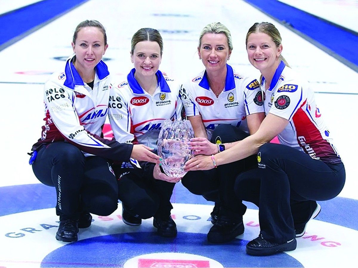 From left: Skip Rachel Homan, third Tracy Fleury, second Emma Miskew and lead Sarah Wilkes celebrate their 2025 Co-op Tour Challenge championship at the Silent Ice Center in Nisku, Alta.