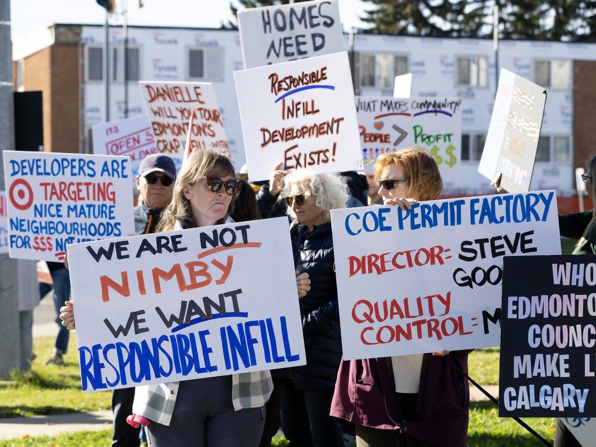 Edmontonians protest high-density, mid-block infill developments allowed under the city's zoning bylaws, at 149 St. and 87 Ave in Edmonton, Sunday Sept. 27, 2026. The protest was one of several city wide infill rallies held Sunday.