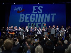 (C-LtoR) Ulrich Siegmund, far-right Alternative for Germany (AfD)'s main candidate in the Saxony-Anhalt state election, AfD co-leaders Tino Chrupalla and Alice Weidel and other party members sing the national anthem at the AfD's election party following Saxony-Anhalt's state elections in Magdeburg, eastern Germany on Sept. 6, 2026. Germany's far-right AfD won a landslide victory in a key regional election on Sept. 6 in the ex-communist east, according to exit polls, but it remain unclear whether it can win an absolute majority to govern.
