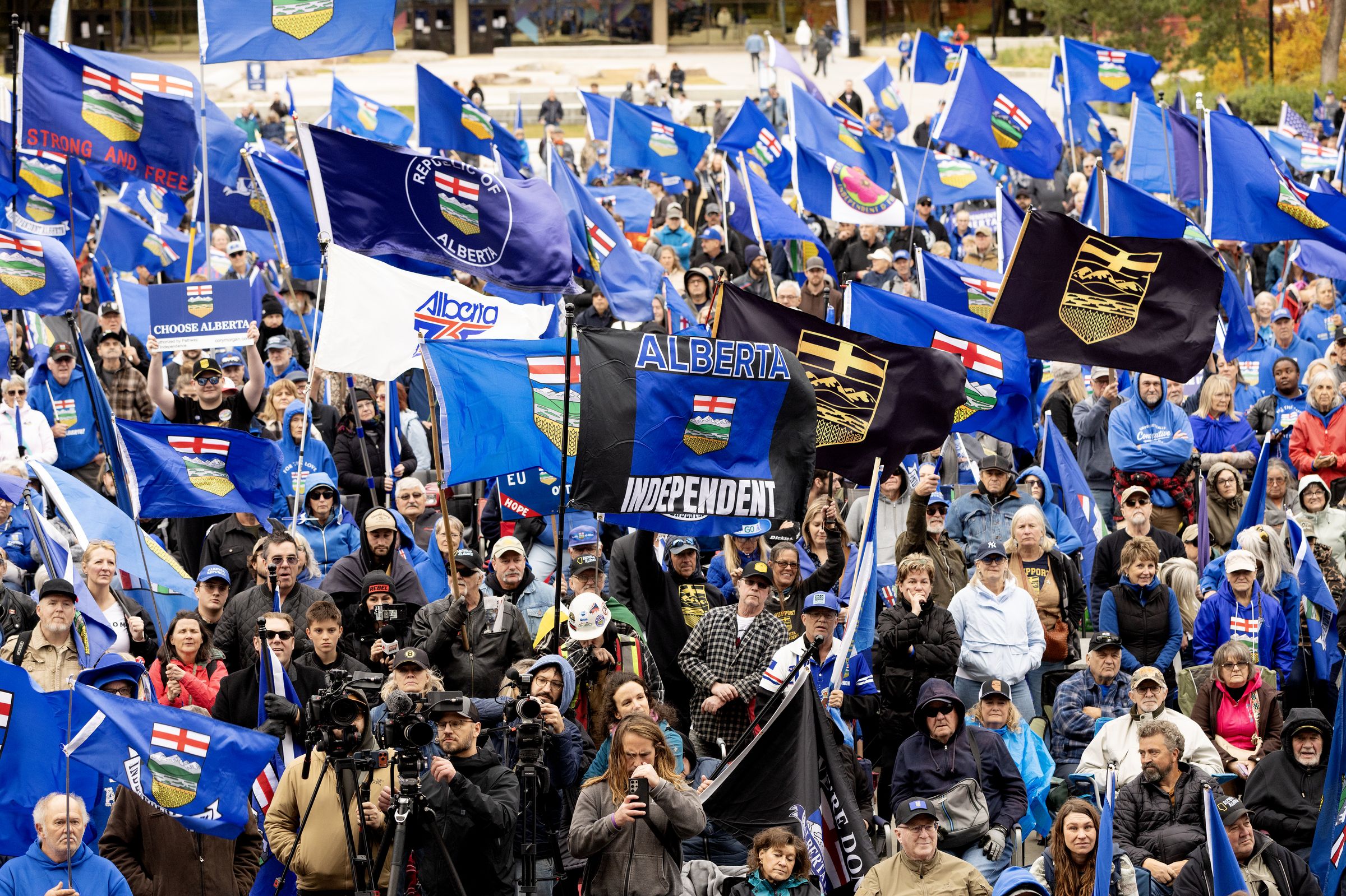 Albertans take part in a pro separation rally outside the Alberta Legislature ahead of Monday's referendum vote, in Edmonton Saturday Oct. 17, 2026.