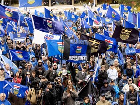 Albertans take part in a pro separation rally outside the Alberta Legislature ahead of Monday's referendum vote, in Edmonton Saturday Oct. 17, 2026.