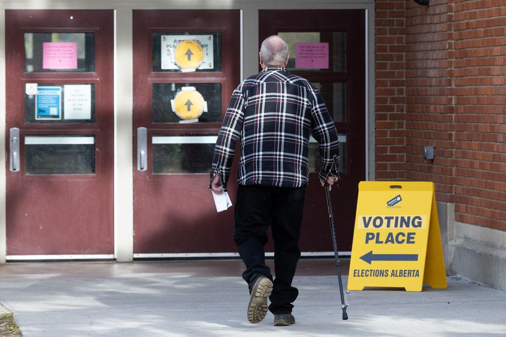 Edmontonians head into an Alberta Referendum polling station at Westminster School, in Edmonton Monday Oct. 19, 2026.