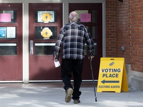 Edmontonians head into an Alberta Referendum polling station at Westminster School, in Edmonton Monday Oct. 19, 2026.