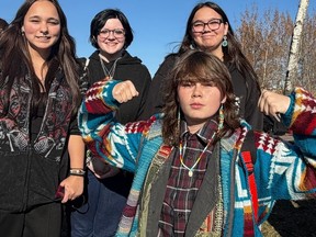 Nelly Cunningham, front, told Postmedia the teacher's post was arrogant and believes the social teacher didn't realize what she was saying.