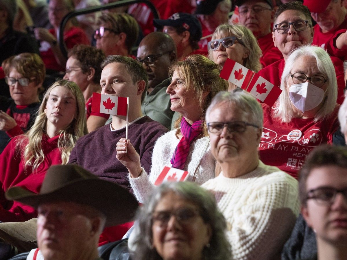 People listen to Prime Minister Mark Carney speak at a rally hosted by Forever Canadian on Friday, October 16, 2026 in Edmonton. Greg Southam-Postmedia