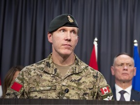 Major-General L.W. Rutland, Commander 1st Canadian Division and David J. McGuinty, Minister of National Defense, and , Canadian Armed Forces listen to a question regarding the tragic events at CFB Wainwright. Taken on Sunday, October 18, 2026 in Edmonton