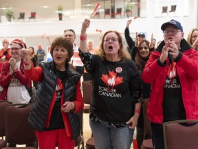 People cheer for Thomas Lukaszuk, former Deputy Premier, MLA, and founder of Forever Canadian as results come at the Forever Canadian referendum night watch party on Monday, October 19, 2026