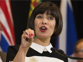 Federal Health Minister Ginette Petitpas Taylor speaks to the media during a health ministers' conference in Edmonton Friday, Oct. 20, 2017.