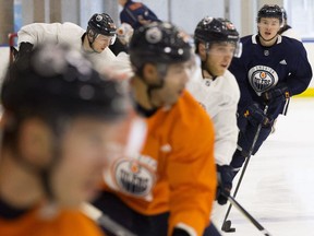 Kailer Yamamoto (far right) takes part in Edmonton Oilers practice on Oct. 30, 2017, at Edmonton's Downtown Community Arena.