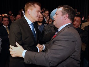 Jason Kenney shakes hands with Brian Jean after it was announced that Kenney was elected leader of the United Conservative Party. The leadership race winner was announced at the BMO Centre in Calgary on Saturday October 28, 2017.