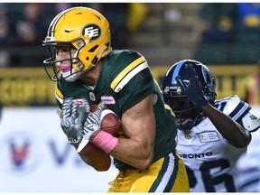 Edmonton Eskimos Brandon Zylstra (83) makes a key catch on 3rd down late in the game setting up an Eskimos touchdown which defeated the Toronto Argonauts 30-27 during CFL action at Commonwealth Satdium in Edmonton, October 14, 2017.