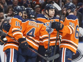 Edmonton Oilers players celebrate a goal against the Dallas Stars on Oct. 26, 2017, during NHL action at Rogers Place.
