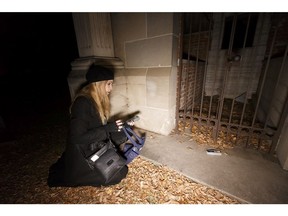 Paranormal investigator Beth Fowler leads a ghost walk in the Edmonton Cemetery in Edmonton on Friday, Oct. 13, 2017.