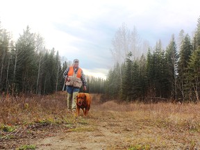 Neil and Penny on a ruffed grouse hunt in the Pembina Oil Field. Neil Waugh