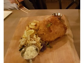 As mentor and friend to London Local Chef Lindsay Porter, Gold Mecal Plates winner Shane Chartrand samples her fish 'n' chips. Graham Hicks Photo