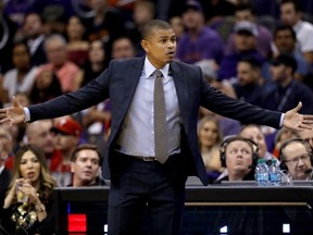 In this Oct. 18, 2017, photo, Phoenix Suns coach Earl Watson reacts to a call during the first half of the team's NBA basketball game against the Portland Trail Blazers, in Phoenix. The Suns announced the firing of coach Earl Watson Sunday night, Oct. 22, 2017, after hours of meetings at the team's headquarters. Assistant coach Jay Triano, a former head coach of the Toronto Raptors, was named interim coach.