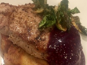 Paul Shufelt's pan-roasted pork chop, with cherry mostarda and butternut squash bread pudding.