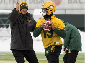 Edmonton Eskimos head coach Jason Maas puts pressure on Mike Reilly during a team practice at Commonwealth Stadium, in Edmonton Wednesday Nov. 8, 2017.