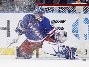 Henrik Lundqvist of the New York Rangers makes the second period save against the San Jose Sharks at Madison Square Garden on October 23, 2017 in New York City.