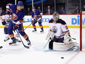 Edmonton Oilers goalie Cam Talbot makes a second-period save against the New York Islanders at the Barclays Center on Nov. 7, 2017, in Brooklyn, N.Y.