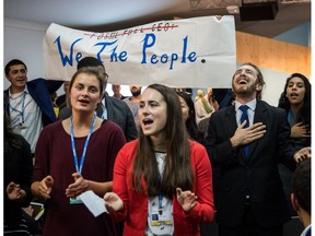 People disturb an event titled: "The Role of Cleaner and More Efficient Fossil Fuels and Nuclear Power in Climate Mitigation" with friendly singing at the COP 23 United Nations Climate Change Conference on November 13, 2017 in Bonn, Germany.