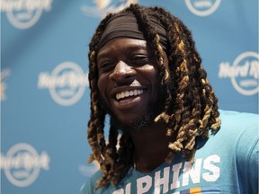 In this Sept. 29, 2017, photo, Miami Dolphins running back Jay Ajayi laughs during a news conference after a training session at Allianz Park in London. The NFL-leading Eagles have bolstered their offence by acquiring running back Jay Ajayi from the Miami Dolphins for a fourth-round pick in 2018. The big move was announced hours before the Oct. 31, 2017, trade deadline.