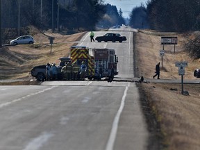 A gravel truck heading north on Golden Spike Rd. collided with a pickup truck westbound on highway 628 causing it to burst into flames killing three occupants of the pickup, just south of Spruce Grove, October 31, 2015.