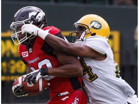 Calgary Stampeders Kamar Jorden (88) is tackled by Edmonton Eskimos Brandyn Thompson (24) during first half CFL pre-season action in Edmonton, Alta., on Sunday June 11, 2017. Thompson's season is over. The Edmonton Eskimos announced Wednesday the veteran defensive back suffered a season-ending ruptured left Achilles during the club's 29-20 home win over the Calgary Stampeders on Saturday.