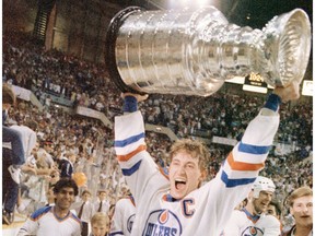 Edmonton Oilers captain Wayne Gretzky lifts the Stanley Cup on May 31, 1985. The 1984-85 Oilers were voted the greatest NHL team off all time by fans and will be celebrated at Rogers Place on Feb. 11, 2018.
