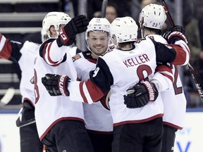 The Arizona Coyotes celebrate a goal during second period NHL hockey action against the Toronto Maple Leafs in Toronto on Monday, November 20, 2017.