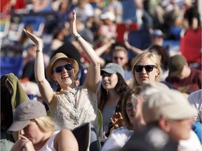 Music fans take in Solo, a collaboration between bands Le Vent du Nord and De Temps Antan, as they perform on the main stage during the Edmonton Folk Music Festival at Gallagher Park in Edmonton on Thursday, August 10, 2017.