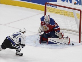 Edmonton's goaltender Travis Child (40) stops a shot by Victoria's Eric Florchuk (14) during overtime at a WHL game between the Edmonton Oil Kings and the Victoria Royals at Rogers Place in Edmonton, Alberta on Wednesday, October 18, 2017. The Oil Kings lost 3-2 in Victoria on Friday.