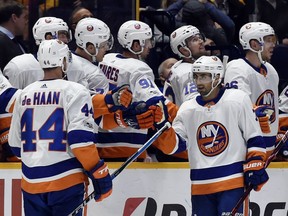 New York Islanders center Jordan Eberle (7) is congratulated after scoring a his second goal of the game against the Nashville Predators during the second period of an NHL hockey game, Saturday, Oct. 28, 2017, in Nashville.