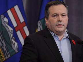 United Conservative Party leader Jason Kenney speaks to reporters the day after being elected UCP leader. Alberta's United Conservatives say they won't support a proposed law that leaves it to students to decide whether to tell their parents if they join a gay-straight alliance.