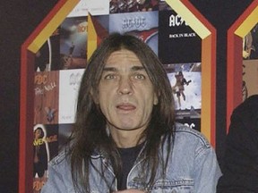 FILE - A March 3, 2003 file photo of AC/DC co-founder and guitarist Malcolm Young at an event in London. The band has announced, Saturday Nov. 18, 2017, that 64-year-old Young has died. (Yui Mok/PA via AP)