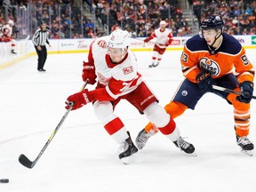 Ryan Nugent-Hopkins #93 of the Edmonton Oilers pursues Dylan Larkin #71 of the Detroit Red Wings at Rogers Place on November 5, 2017 in Edmonton.