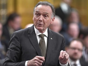 Conservative MP Peter Kent asks a question in the House of Commons on Parliament Hill in Ottawa on Monday, Nov. 20, 2017. THE CANADIAN PRESS/Justin Tang