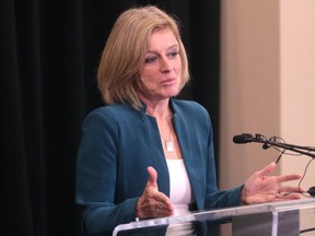 Premier Rachel Notley answers reporters' questions after speaking at the Alberta Urban Municipalities Association convention Thursday, Nov. 23, 2017.