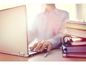 Businessman or designer using laptop computer at desk in office

Model and Property Released