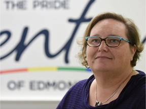 Kristy Harcourt, program manager of the Pride Centre of Edmonton, discusses an apology by Prime Minister Justin Trudeau to LGBT Canadians who were persecuted, in Edmonton on Nov. 30, 2017.