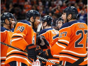 Edmonton Oilers forward Leon Draisaitl (29) celebrates a goal with teammates Darnell Nurse (25) and Ryan Strome (18) against the Montreal Canadiens on Dec. 23, 2017, at Rogers Place in Edmonton. (Getty Images)