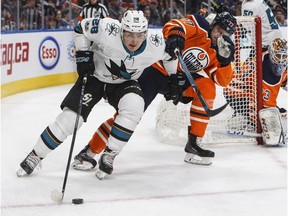 San Jose Sharks' Timo Meier (28) is chased by Edmonton Oilers' Oscar Klefbom (77) during first period NHL action in Edmonton, Alta., on Monday December 18, 2017.
